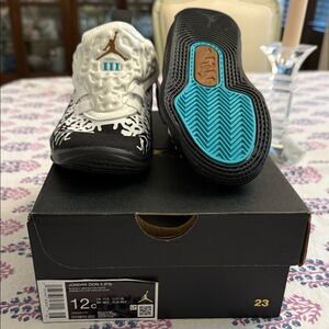 Jordan Zion 3: Size 12C Jordan Kids' Black, White, and Teal Sneakers